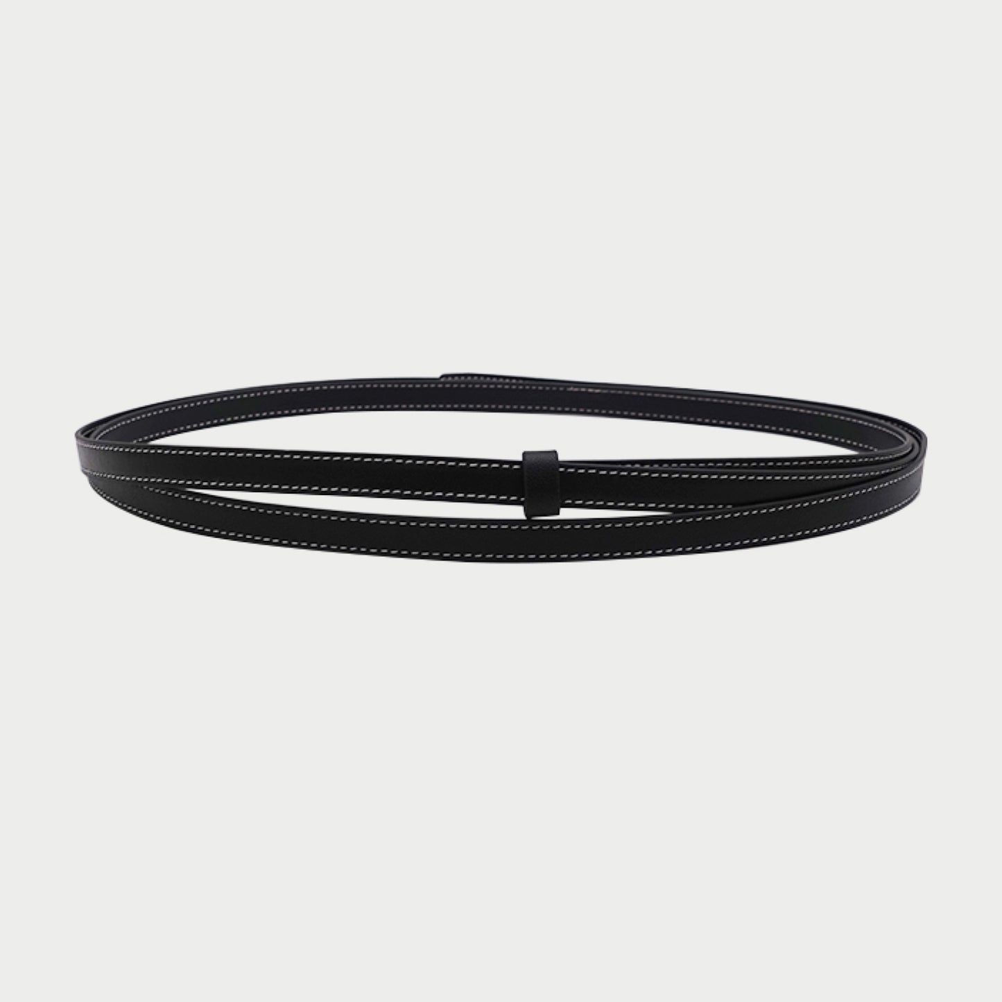 Black belt with white stitching on a light gray background