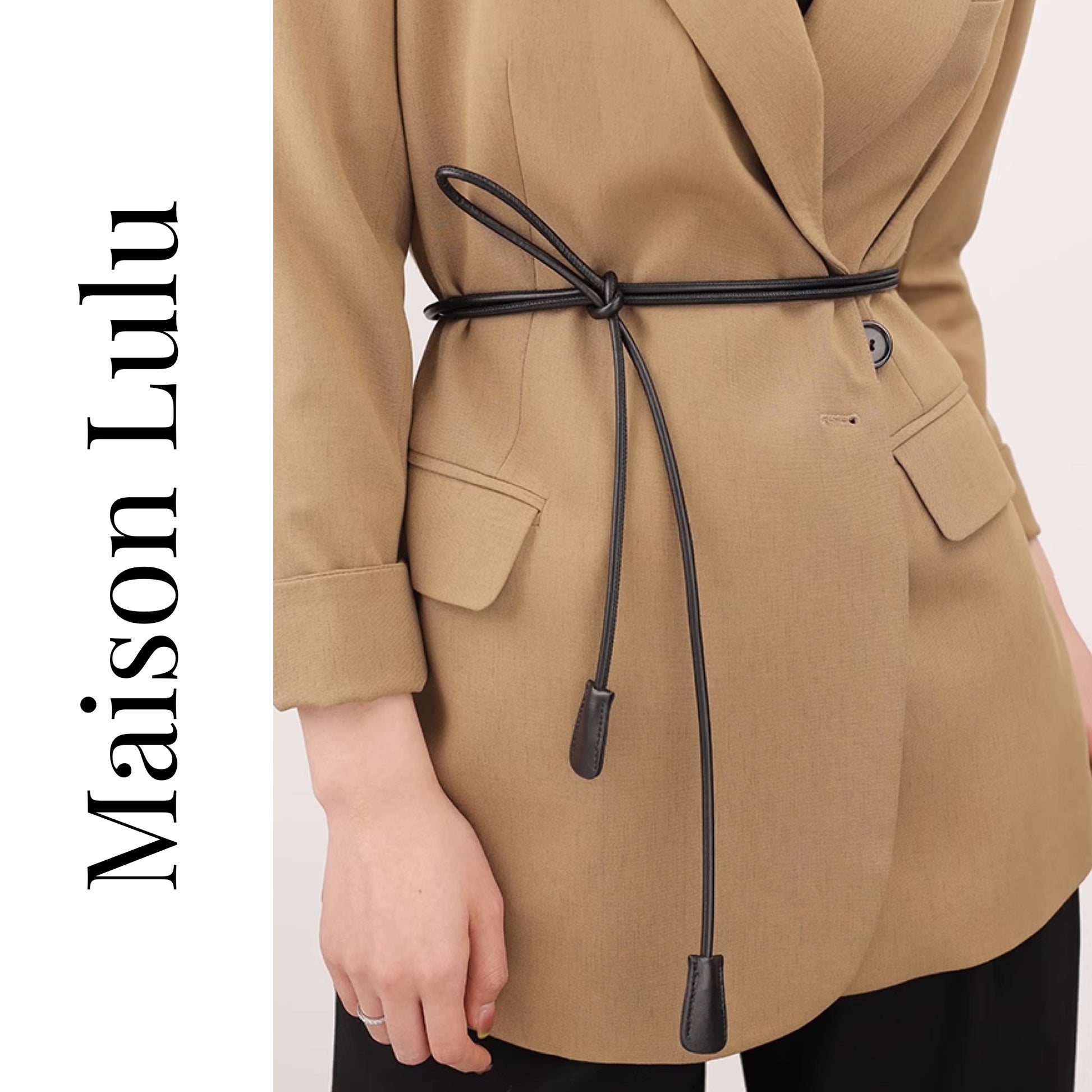 Tan coat with a black belt and 'Maison Lulu' branding on a white background