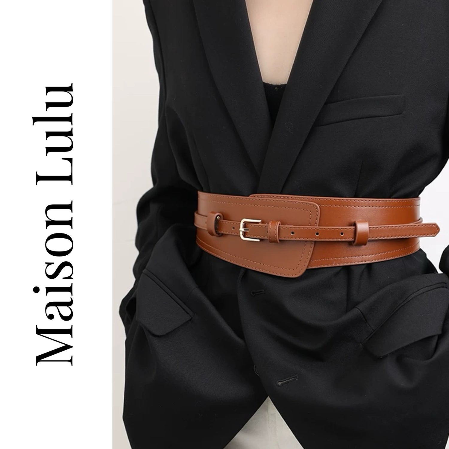 Person wearing a black outfit with a brown belt, featuring the brand 'Maison Lulu'.